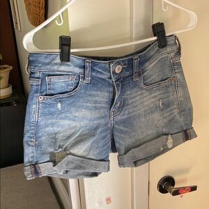 Express Light Blue stretchy denim shirts with distressed details